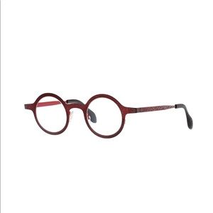 Theo Mille+64 titanium round Belgian frame